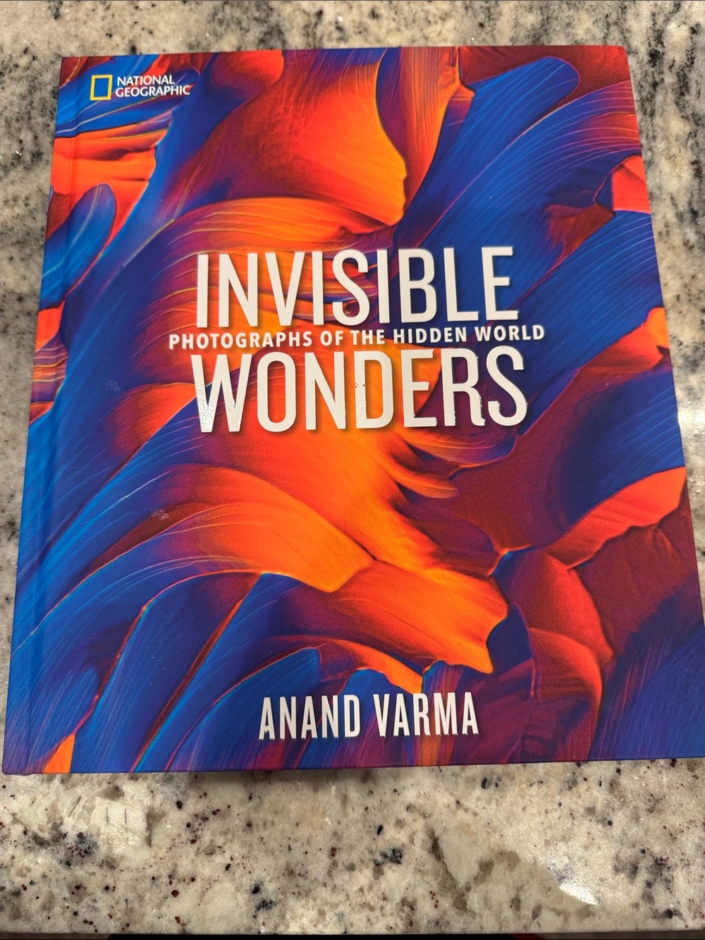 National Geographic Invisible Wonders Book - Blue & Orange Cover